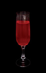Wineglass on black background, rose wine