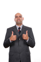 young business man going thumbs up, isolated on white background