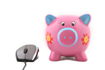 Isolated computer mouse and Piggy bank