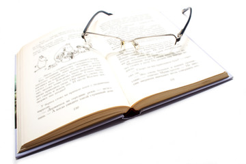 Isolated book and glases