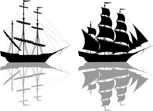 Two black old ships isolated on white