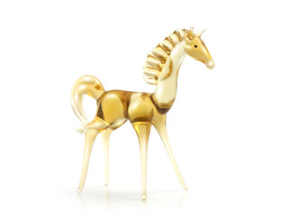 Glass yellow horse isolated on white. Clipping path including