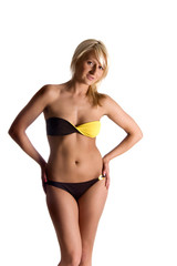 Fototapeta premium attractive girl in bikini is standing in front of camera