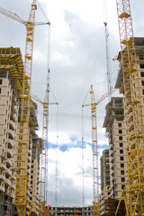 Building site on a background of the cloudy sky