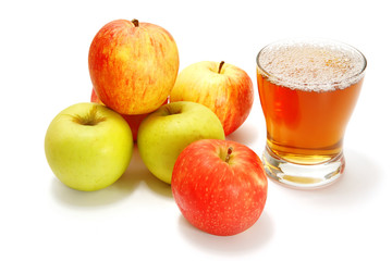 apples over white with full glass