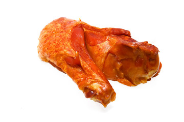 single chicken wing over white