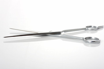 long stainless scissor isolated on a white background