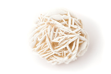 Desert rose (gypsum crystal) close-up, isolated on white.