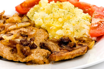 Steak vom Schweinefleisch-geröstet auf Zwiebeln