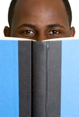 Man Hiding Behind Book