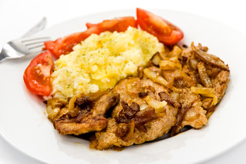 Steak vom Schweinefleisch-geröstet auf Zwiebeln