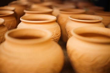 Fototapeta na wymiar Selective focus, on traditional African ceramic pottery