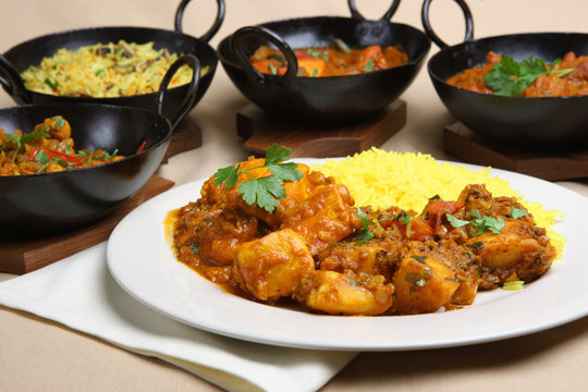 Chicken pathia curry with rice and Bombay aloo