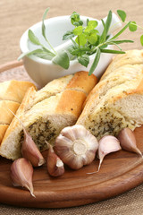 garlic baguette with fresh herbs and butter