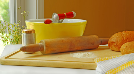 Country kitchen with bread making supplies on counter