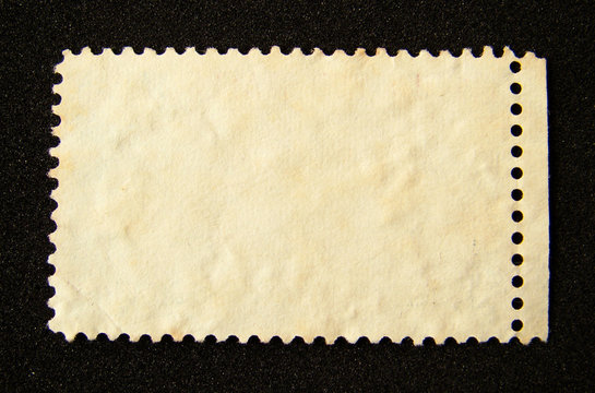 Blank postage stamp on black background.