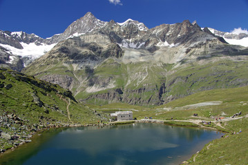 Naklejka na ściany i meble Górskie jezioro w Valais