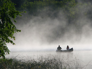 Fishing in the morning fog on the lake in Minnesota