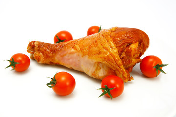hot tasty turkey leg and cherry tomatoes