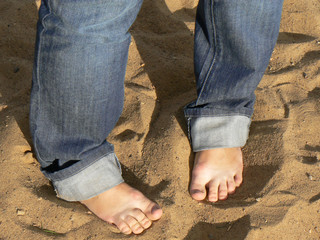 Legs on sand