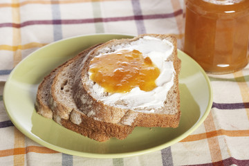 Toast with jam with soft shadow on background. Shallow DOF