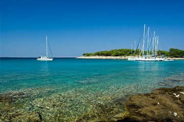 Sail boats docked in beautiful bay, Adriatic sea, Croatia