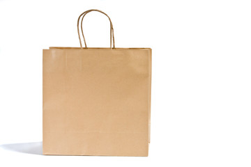 Paper shopping bag on white background.