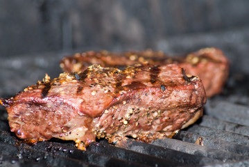 Some fresh meat being barbecued on the grill