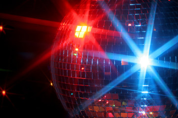 mirror disco ball giving off a party vibe at a discoteque