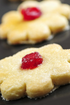 Fresh shortbread cookies on a baking tray