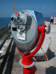 Red Telescope on Ocean Pier