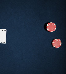 Casino chips on a blue background. Vegas poker concept