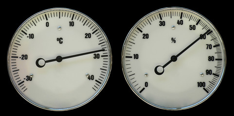 Naklejka premium Thermometer and hydrometer isolated on black