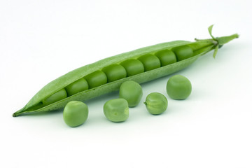 Pea pod and several peas