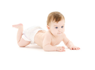 bright picture of crawling baby boy in diaper