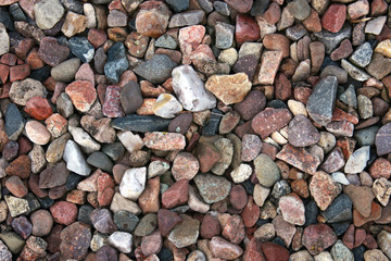 multi colored river rock makes a stone background