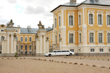 Wedding car waiting in front of palace