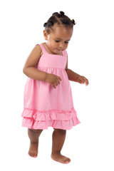 adorable happy baby learning to walk a over white background