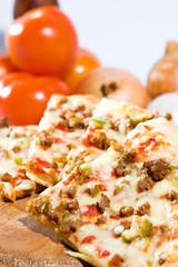 hot pan pizza with cheese on a dish.