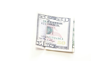 Folded $50 Bill on white background.