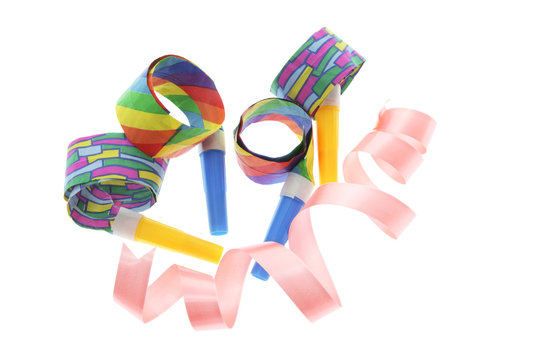 Party Blowers and Curling Ribbon on White Background