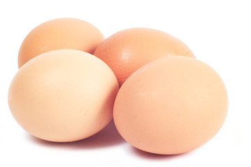 Four eggs.Color of chicken eggs - brown.