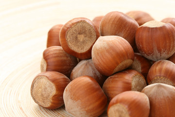 close-ups of hazelnuts on wooden table
