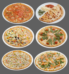 Six pizzas on white plates. Grey background.