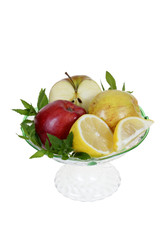 pieces of fruits with mint on tray isolated on white background