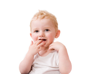 Cute caucasian blond toddler is happy