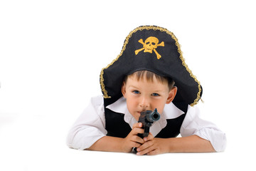 Lying pirate boy on isolated white background