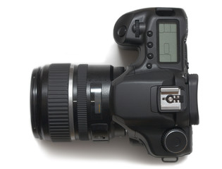 The film camera with an objective on a white background