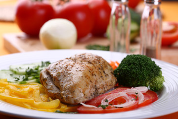 Roasted chicken fillet with vegetable salad