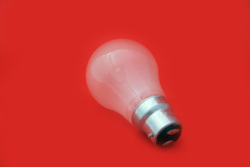 Lightbulb with a red background